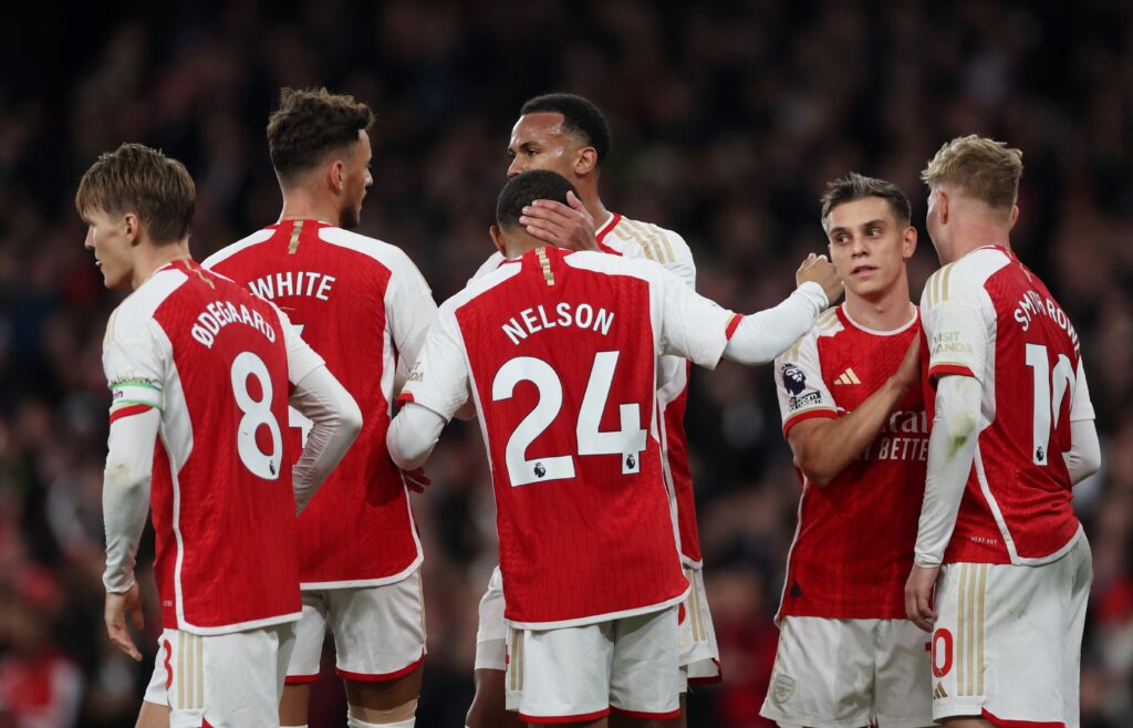 Arsenal players celebrating a goal against Luton